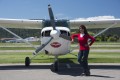 Ramona in front of her airplane